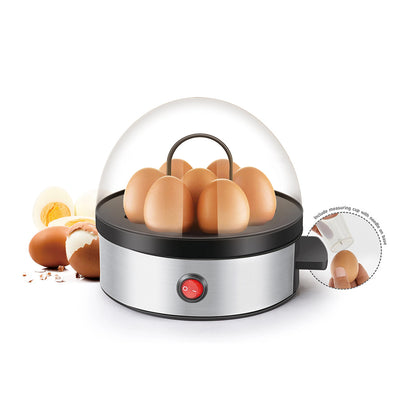 Mini electric egg cooker steaming eggs in stainless steel tray
