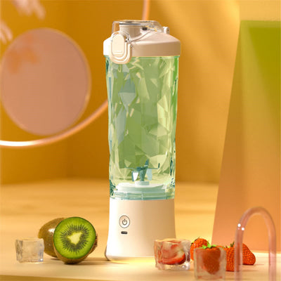 White Portable blender charging with USB cable